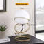 Lampe de table sur pied en verre et verre