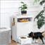 Armoire de rangement blanche avec bols surélevés