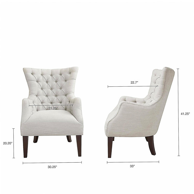 Fauteuil à oreilles capitonné
