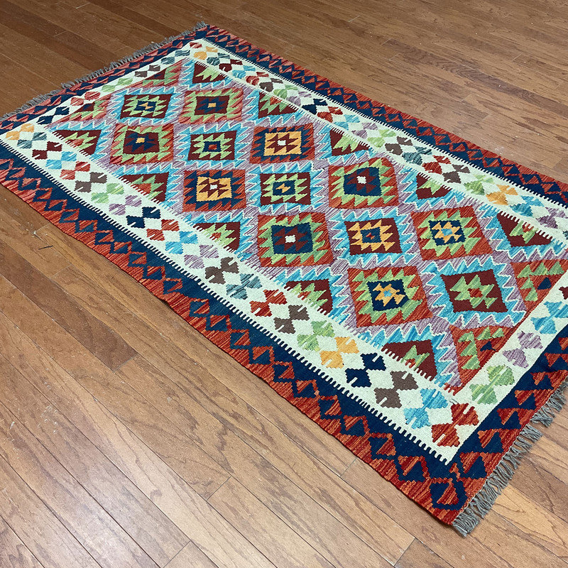 Tapis rouille unique de 3 pi 11 po x 6 pi 8 po