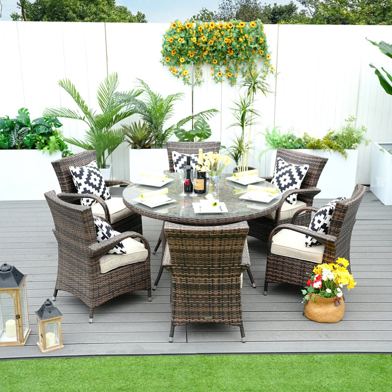Indiya 6 - Person Premium All-Weather Wicker Patio Dining Set with Round Table , Cushions Included