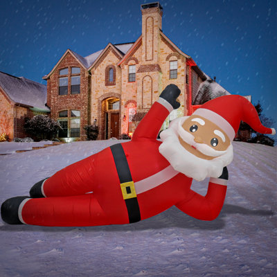 First Traditions'' 12 Ft. Inflatable Relaxing Santa