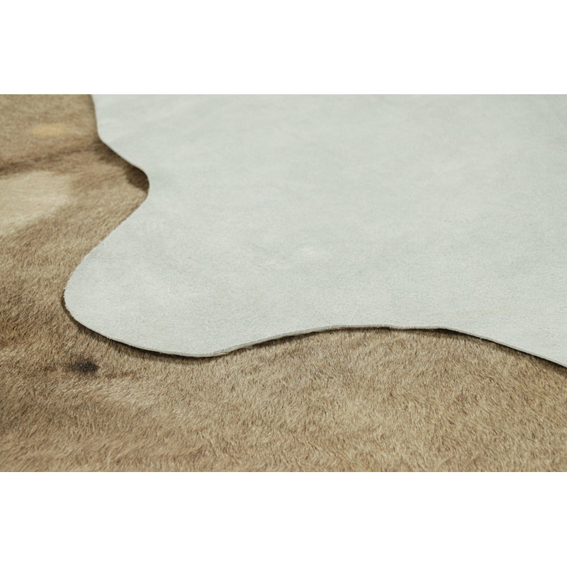 Rug & Kilim’S Large Cowhide Rug In Beige-Brown, Camel And Cream Tones