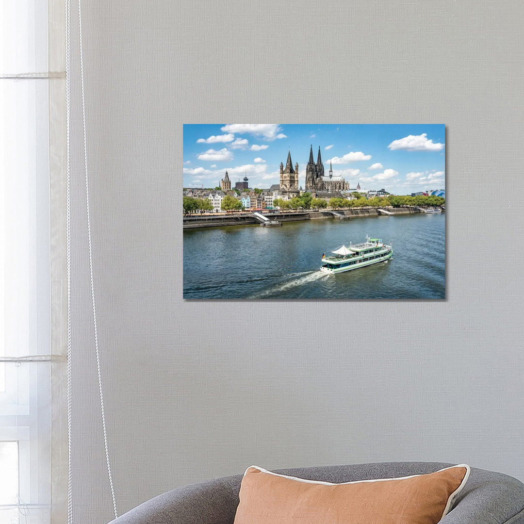 City Of Cologne Along The Rhine River With Cologne Cathedral And Great St. Martin Church by Jan Becke - Wrapped Canvas Print