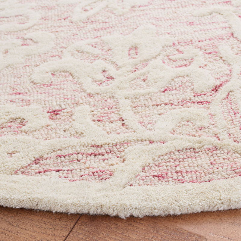 Handmade Pink and Ivory Tufted Round Wool Rug