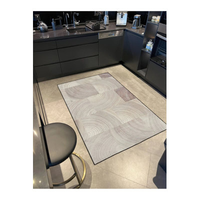Tapis lavable crème à motifs tissés