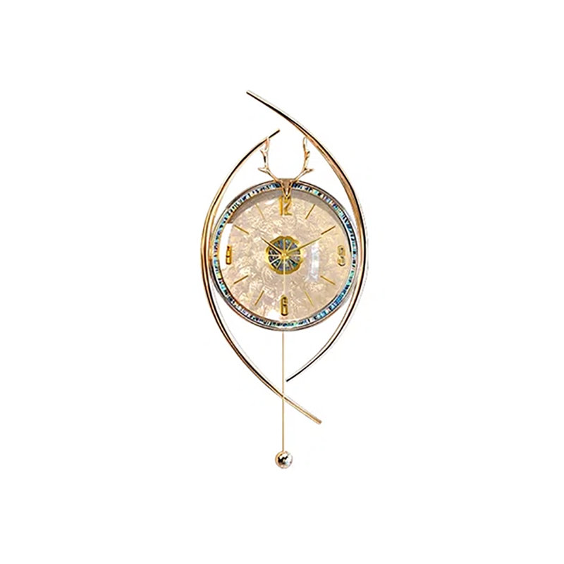 Horloge murale dorée en forme de coquillage