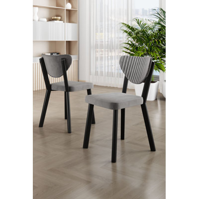 Ensemble de chaises élégantes en métal (4 pièces) - gris et noir | Structure 100% métal, envers en contreplaqué, tissu Babyface | Dimensions: 17,7 po x 33,9 po x 18,1 po | Confortable dossier 22 en mousse et siège en mousse 28 po | Design moderne pour la maison et le bureau