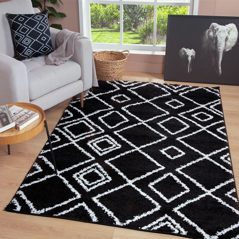 Tapis noir à motifs géométriques, Rectangle 6 pi 7 po x 9 pi 2 po