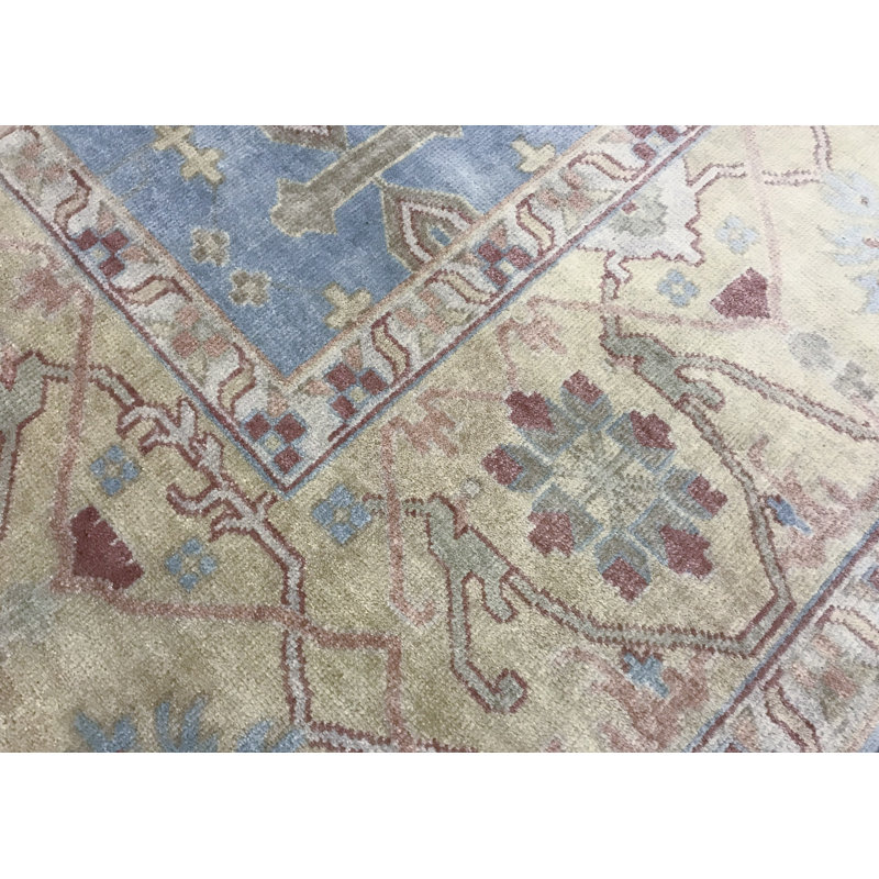 Tapis bleu et ivoire de haute qualité noué à la main