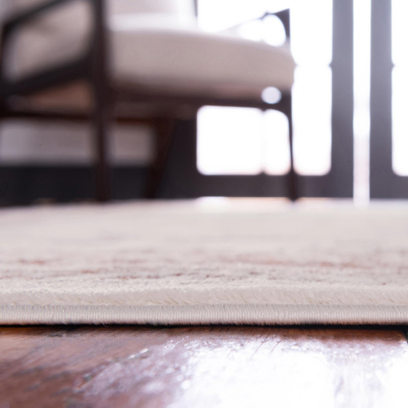Tapis traditionnel traditionnel Emigdio de couleur crème, Ovale 6 pi x 9 pi