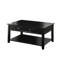 Table basse fonctionnelle noire avec pieds relevables et compartiment de rangement inférieur