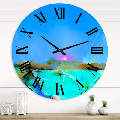 Coucher de soleil coloré dans différentes nuances de bleu - Horloge murale traditionnelle