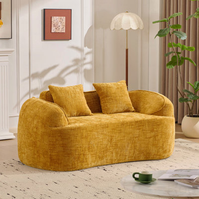 Curved Two - Person Compress Sofa. It Has Armrests On Both Sides, Comes With Two Pillows