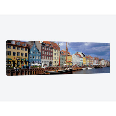 " Brightly Colored Waterfront Townhouses, Nyhavn, Copenhagen, Denmark " by Panoramic Images