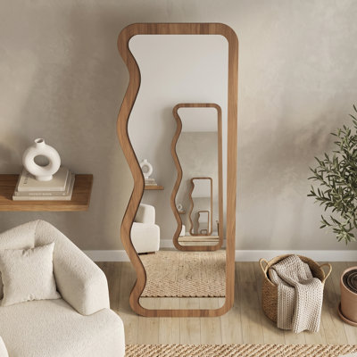 Miroir autoportant incurvé unique