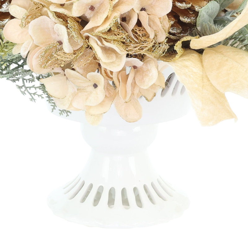 Arrangement d'hortensias des Fêtes dans un vase à piédestal
