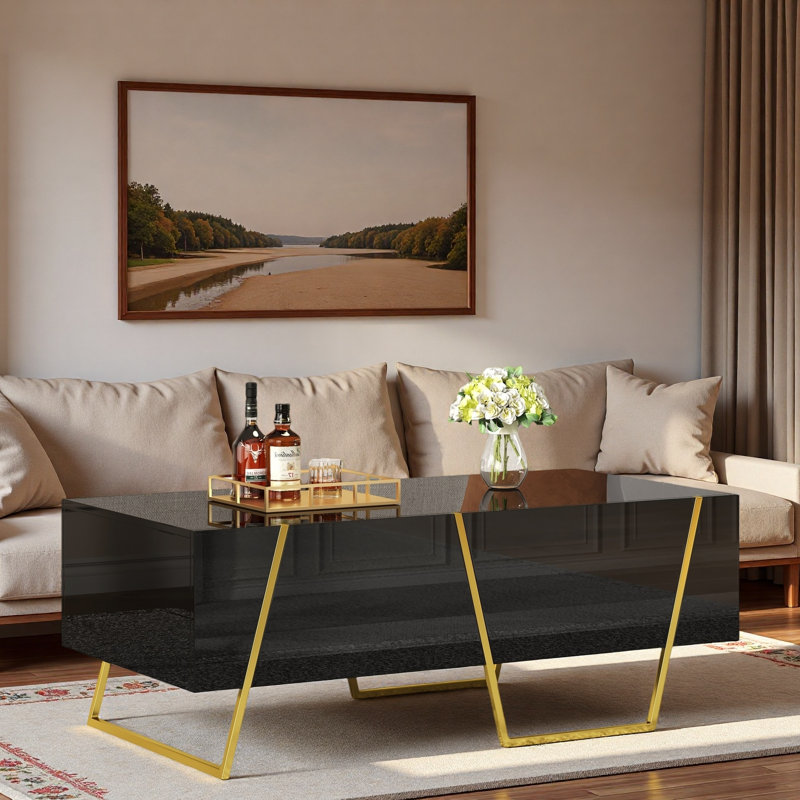 Table basse moderne moderne avec 4 tiroirs, base dorée et surface noire ultrabrillante