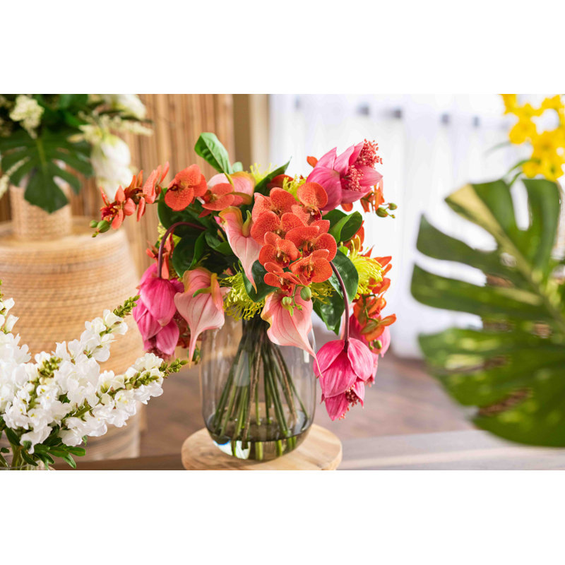 Isle of Magnifica Orchid Floral Arrangements in Vase