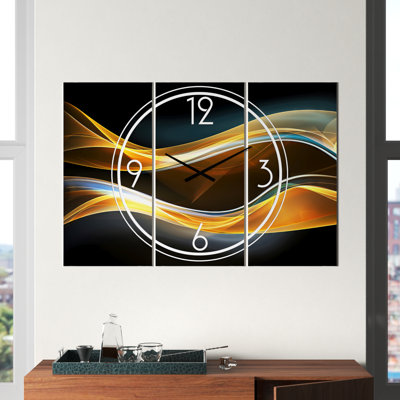 Vagues dorées en noir - horloge murale moderne