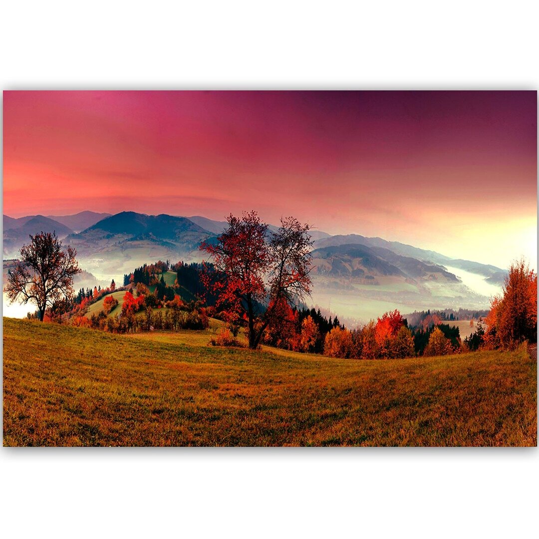 Leinwandbild Hügel mit herbstlichen Bäumen