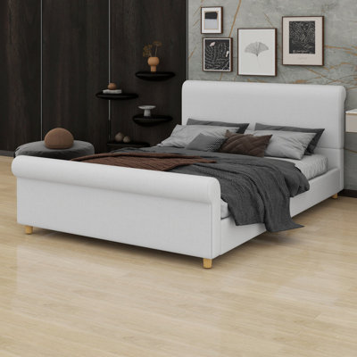 Bed frame with high headboard and rolled footboard with screw-locked slat construction for noise-free nights