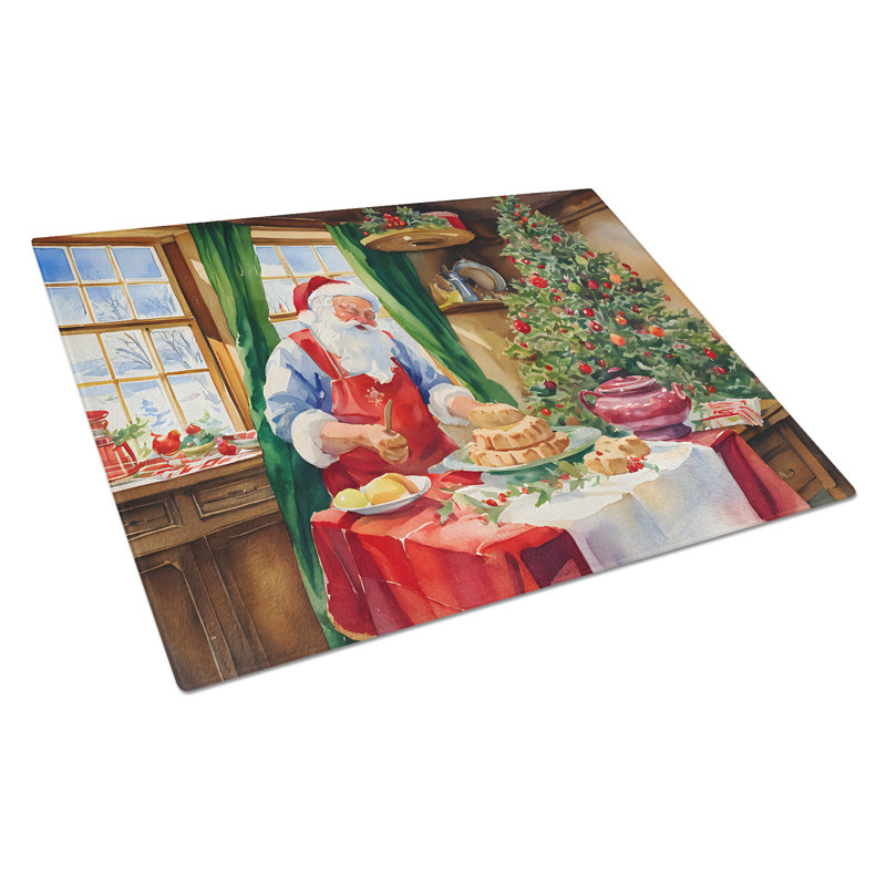 Planche à découper en forme de biscuits avec père Noël