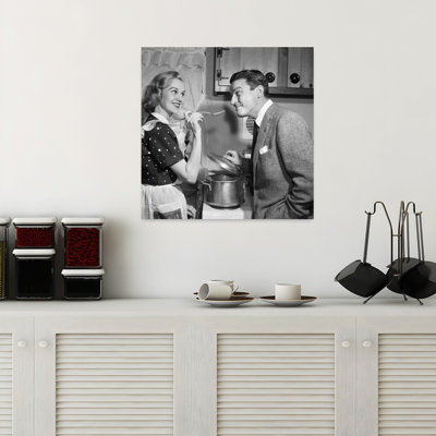 1950S Smiling Housewife At Stove Giving Happy Husband Taste Of Her Cooking Contemporary Wall Art