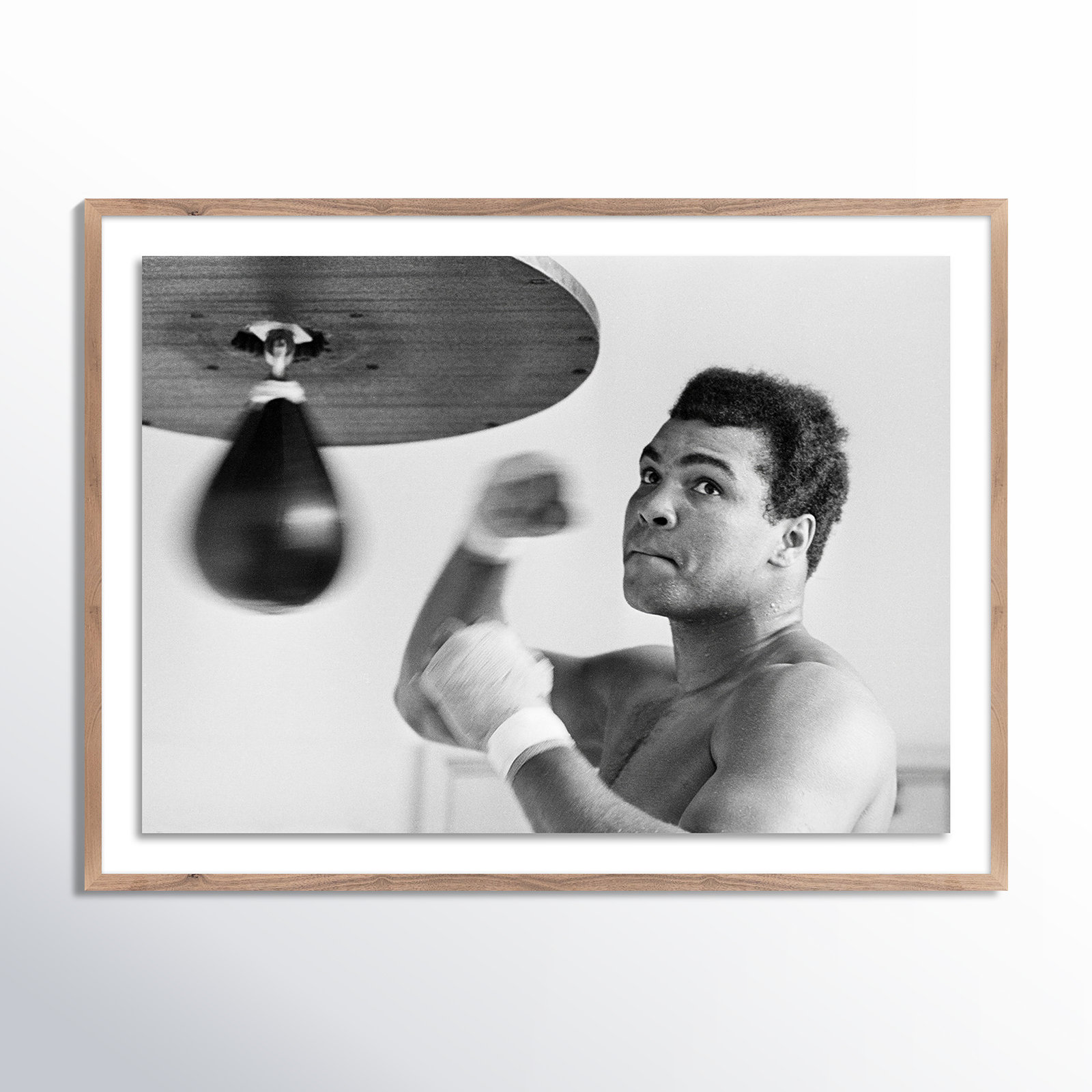 Muhammad Ali Punching Bag by Getty Images, Rustic Walnut Framed, 18" H x 24" W