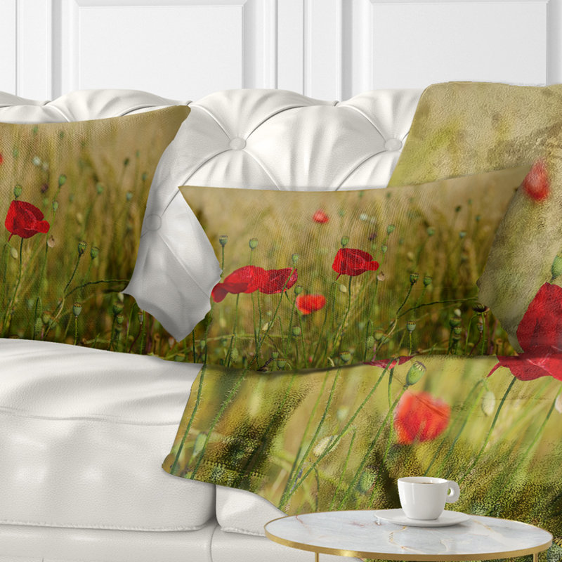 Coussin rouge à motif de coquelicots rouges