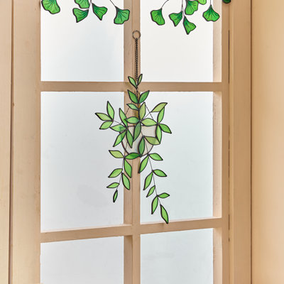 Panneau de fenêtre floral et plantes
