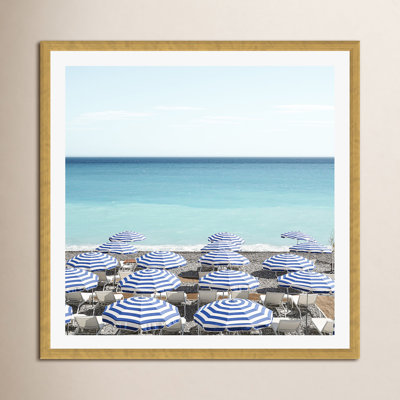 Blue Beach Umbrellas Photo by Henrike Schenk