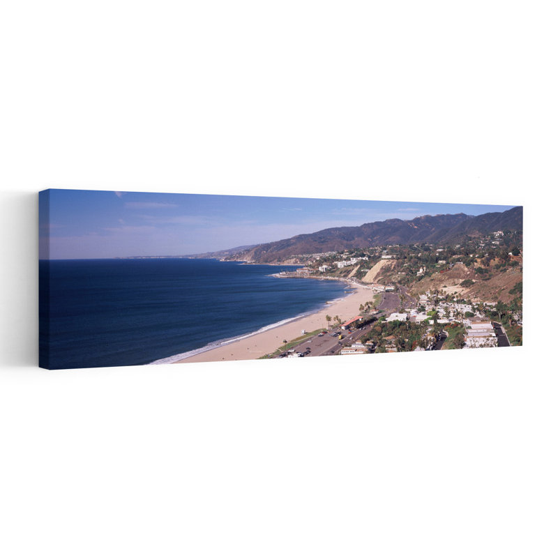 High Angle View Of A Beach Highway 101 Malibu Beach Malibu Los Angeles County California USA by Dan Merkel - Wrapped Canvas Panoramic Print
