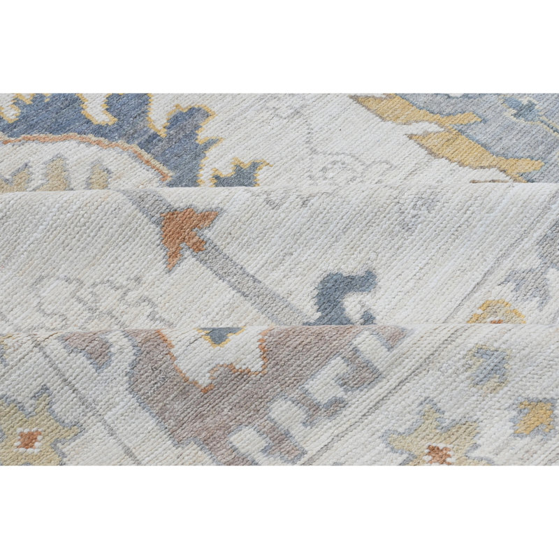 Tapis ivoire noué à la main de haute qualité