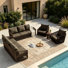 Ensemble de patio d'extérieur pivotant en corde pour huit personnes avec coussins et table d'appoint