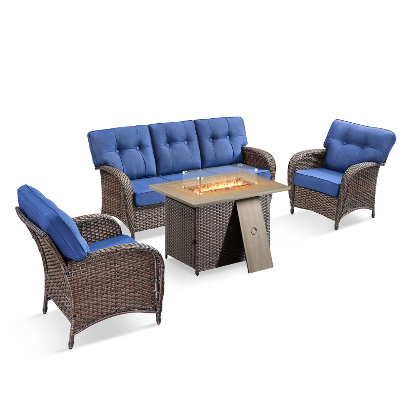 Ensemble de conversation d'extérieur en osier 4 pièces avec coussins et table de foyer rectangulaire Fiorillo, Bleu