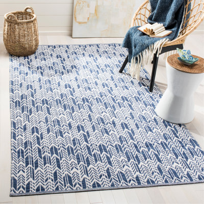 Tapis à chevrons bleu marine / ivoire Paz