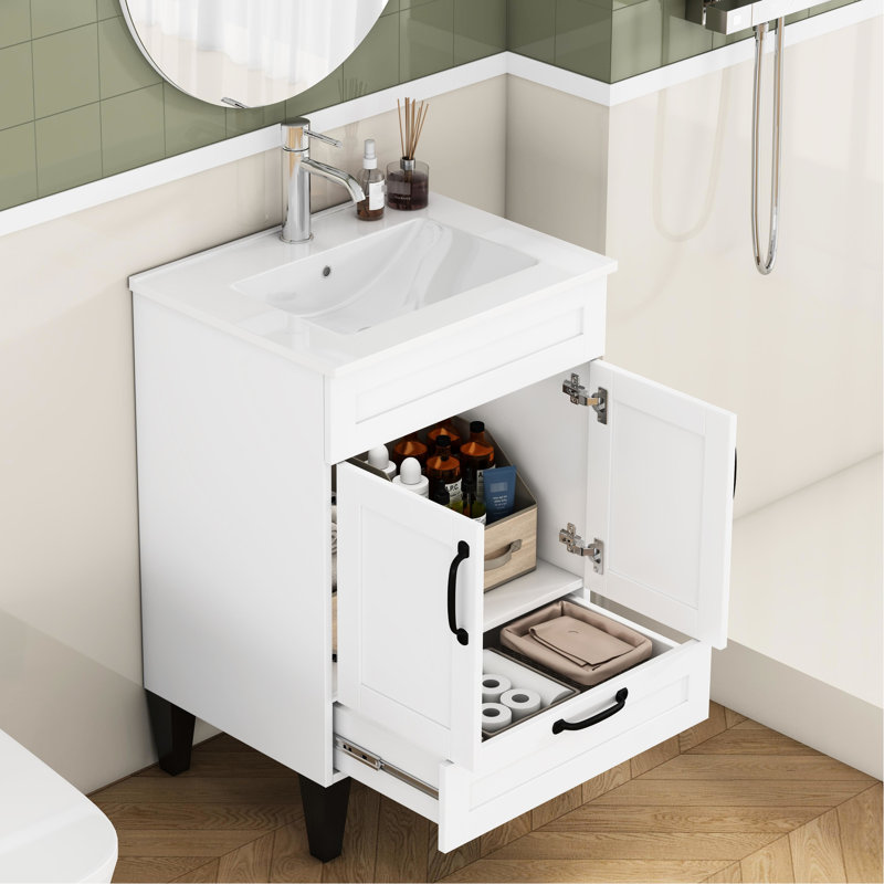 Meuble-lavabo blanc de 24 po avec lavabo, poignées en métal noir, charnières à fermeture en douceur, rangement pour les serviettes