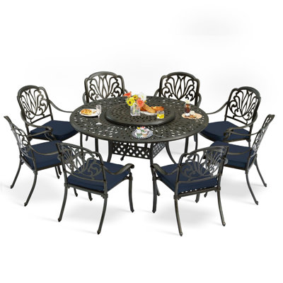 9-Piece Dining Set includes 1 round table with detachable lazy susan, 8 cushioned chairs