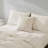 Calvin Klein Emblem Beige Throw Pillow