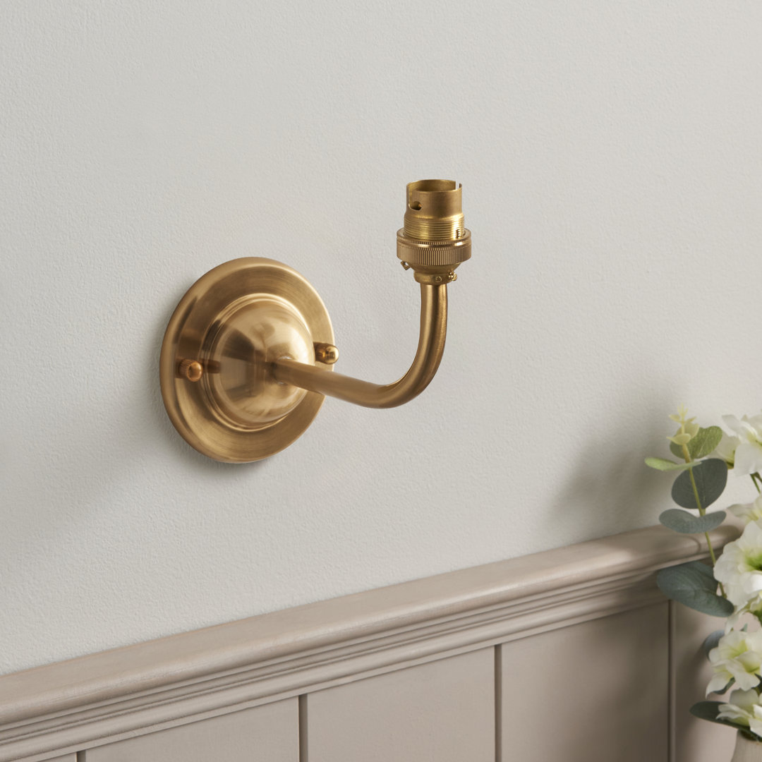 Dome Arc Wall Fitting finished in Br Aged Brass