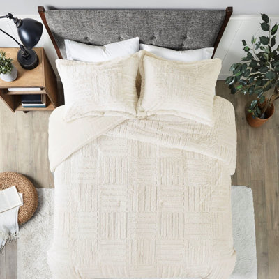 Édredon en duvet synthétique et fausse fourrure avec fonction damier pour une nuit de sommeil confortable