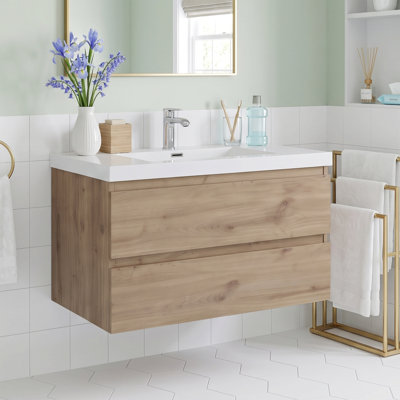 Meuble-lavabo mural de 76 cm (30 po) en panneaux de particules mélaminés (MFC) avec dessus en résine blanche brillante et carbonate de calcium, deux tiroirs coulissants en forme de U à fermeture douce, préassemblé
