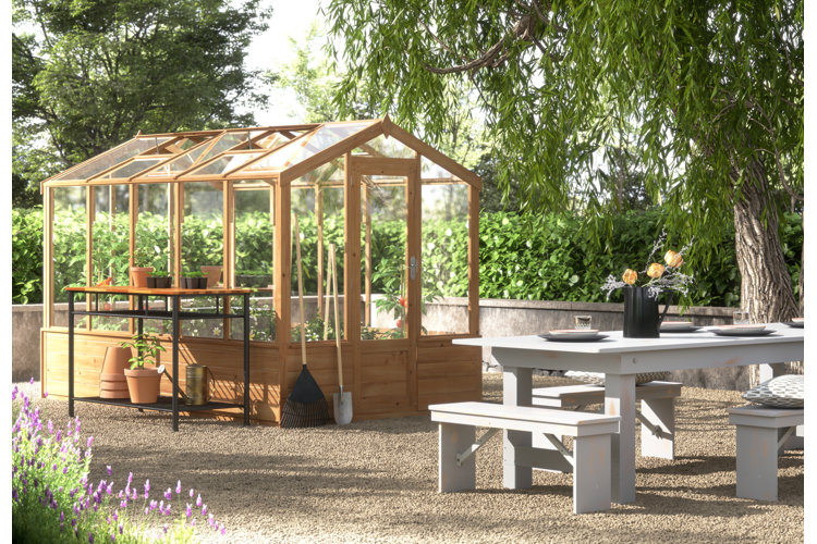 wood greenhouse with a potting table
