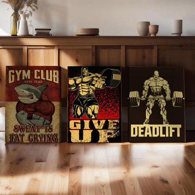 Ensemble de 3 affiches murales encadrées, de style vintage, sur toile, pour salle de sport ou bureau. Affiches de motivation fitness avec un culturiste soulevant des haltères et la citation « La sueur, c'est du gras qui pleure ». Décor rétro idéal pour un gym à domicile, un espace de musculation, un coin détente ou un bureau.