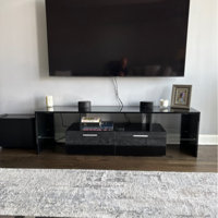 Antwann Modern LED TV Stand for 70 TVs, Wood Entertainment Center with 2  Cabinets, Quick Assembly