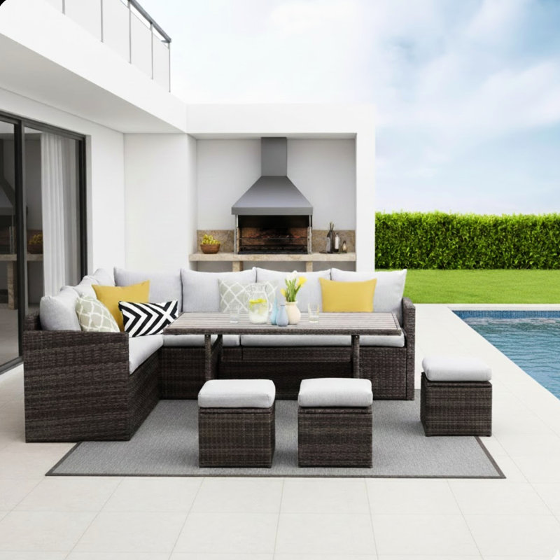 7 repas d'extérieur avec 9 places assises, coussins gris et patins pour la piscine
