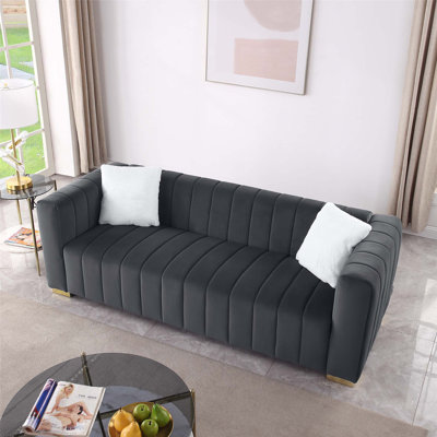 Luxurious Velvet Upholstered Sofa with Plush Multi-Density Foam Cushions, Perfect for Traditional and Contemporary Interiors.