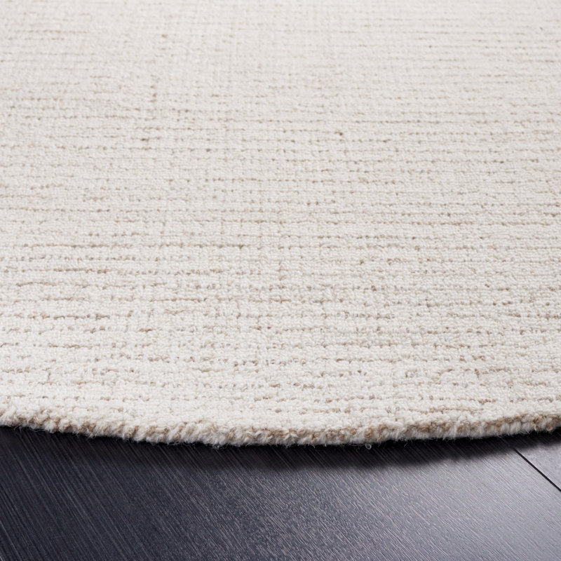 Armina Handmade Tufted Wool Ivory/Beige Area Rug, Round 4'