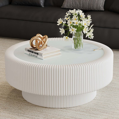 Table basse ronde cannelée moderne avec rangement caché et plateau en verre trempé